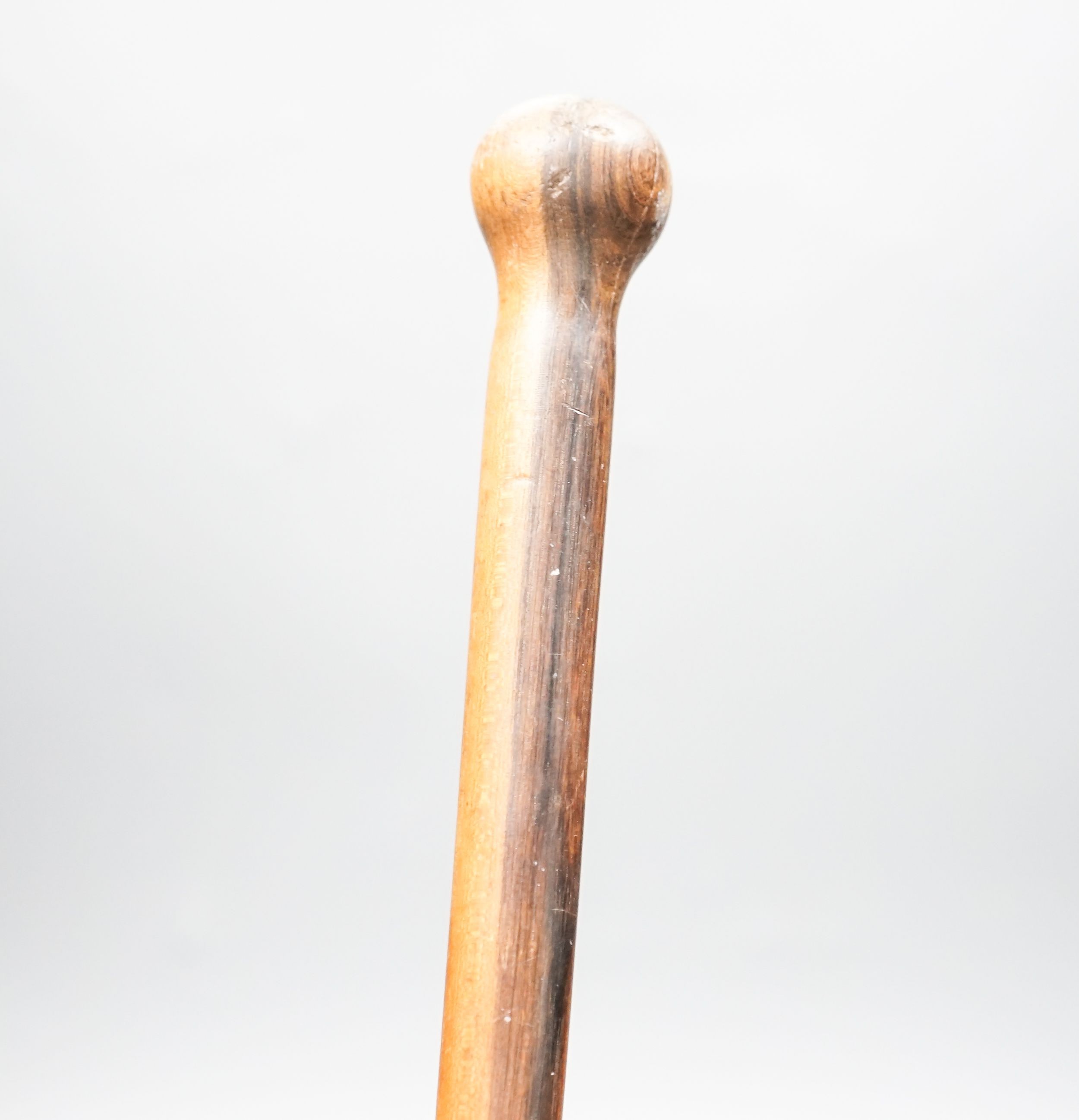 An ebony walking cane